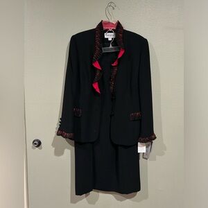 Beautiful black suit with matching long skirt, embellished with red beading.